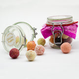 Glückskugeln im Glas